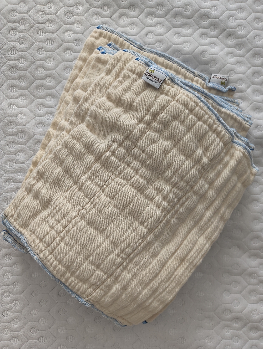 Cloth diaper bundle: 10 OsoCozy Size 1 prefolds + 20 inserts + 3 Snappi fastener